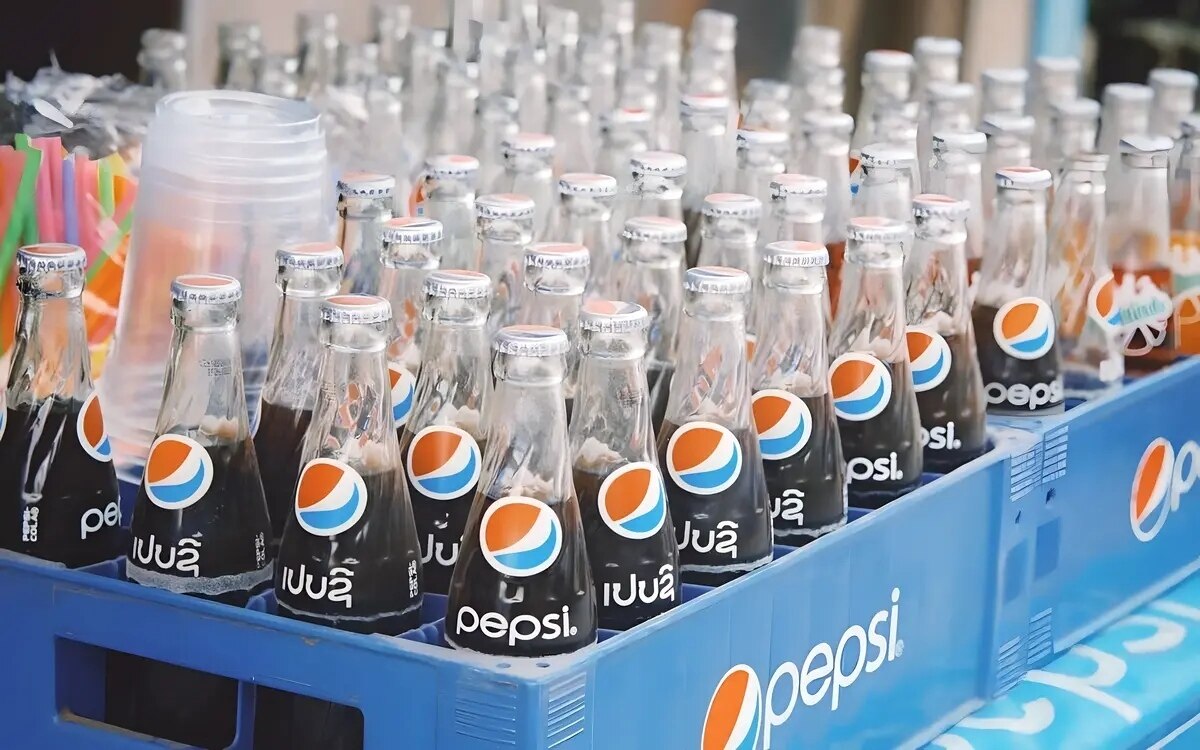 Wie gelang es coca cola und pepsi in thailand fuss zu fassen